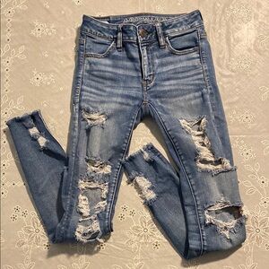 American Eagle Outfitters Skinny Blue Jeans with Distressed Details